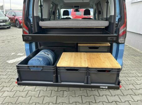 vw caddy mit bett heckauszug